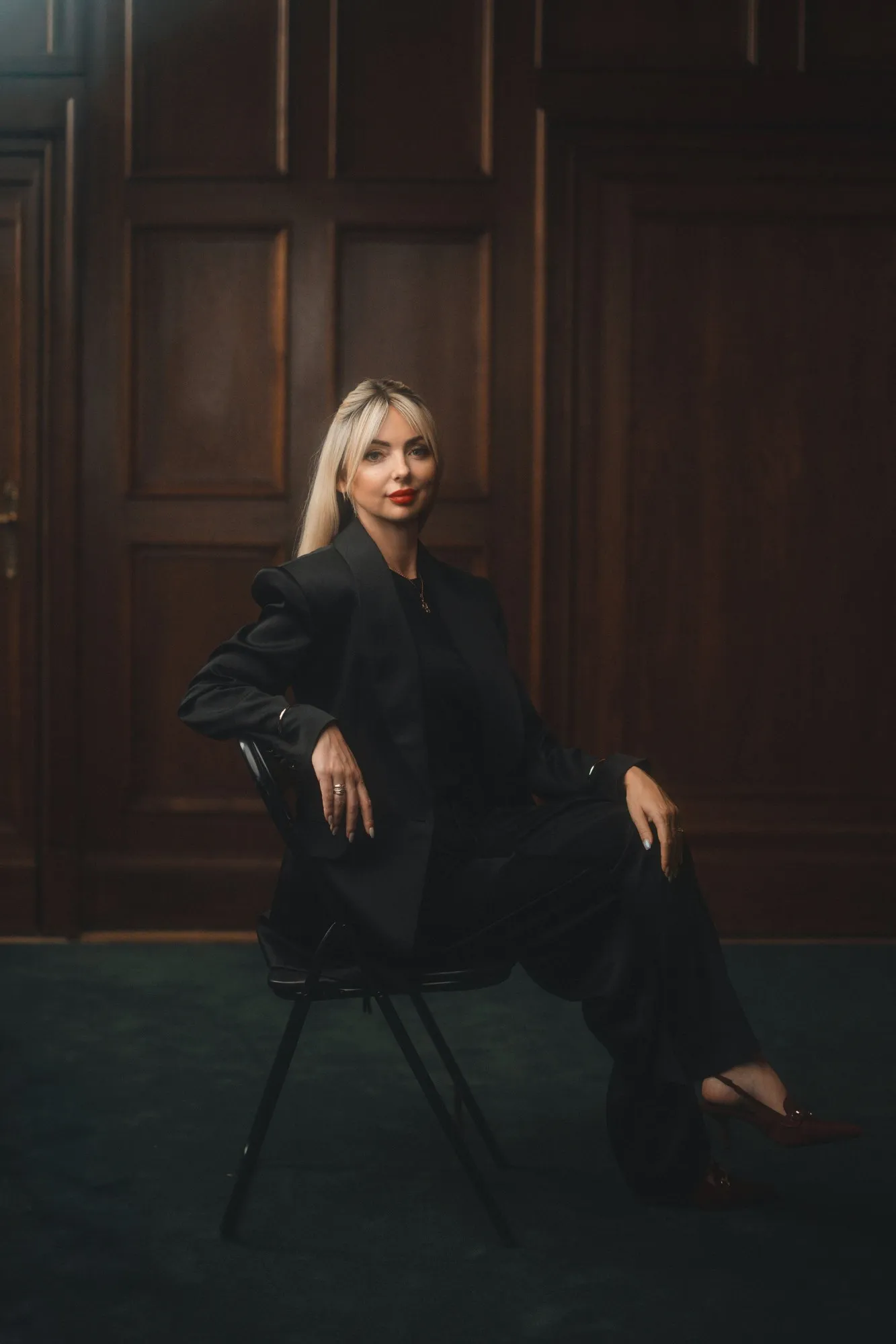 Iwona Kmiecik, portrait in a wood-panelled interior